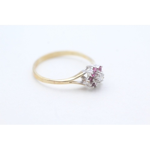 192 - 9ct gold diamond and ruby set floral cluster ring (1.7g) Size R