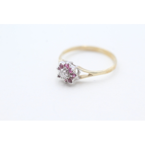 192 - 9ct gold diamond and ruby set floral cluster ring (1.7g) Size R