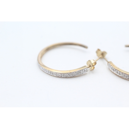 196 - 9ct gold diamond set half hoop earrings (2.7g)