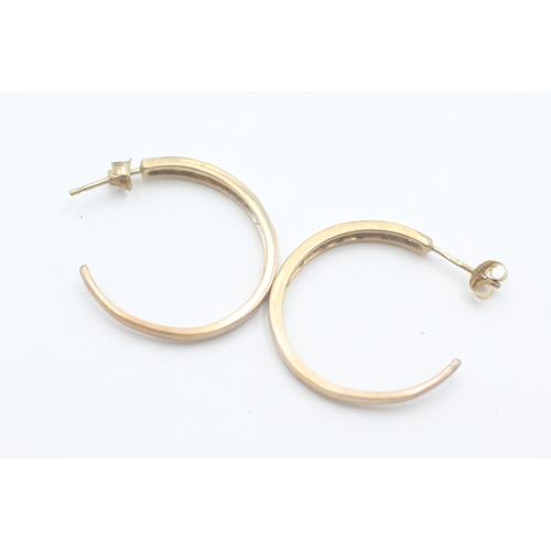 196 - 9ct gold diamond set half hoop earrings (2.7g)