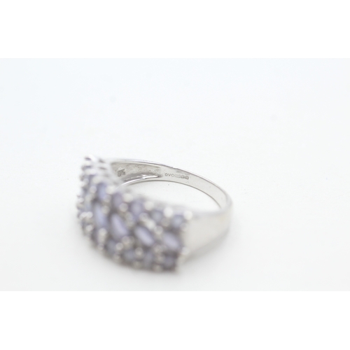 200 - 9ct white gold tanzanite set band ring (3.8g) Size M