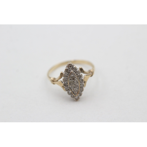 213 - 9ct gold diamond set marquise shaped ring (2g) Size L