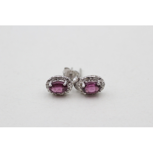 217 - 14ct white gold diamond and garnet set cluster stud earrings (1.4g)