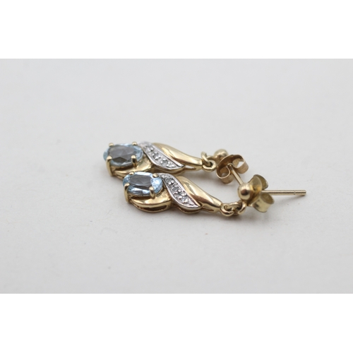 218 - 9ct gold blue topaz set drop earrings (1.8g)