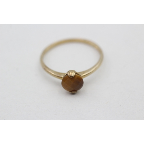 219 - 9ct gold chequer cut tigers eye stacking ring (1.5g) Size U