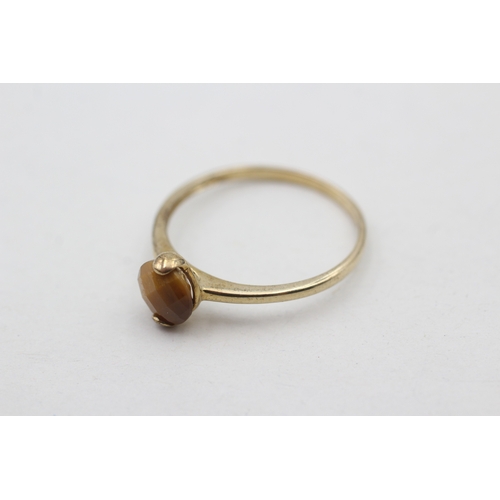 219 - 9ct gold chequer cut tigers eye stacking ring (1.5g) Size U