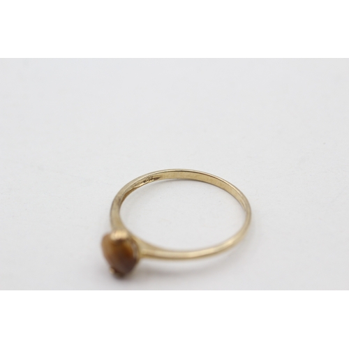 219 - 9ct gold chequer cut tigers eye stacking ring (1.5g) Size U