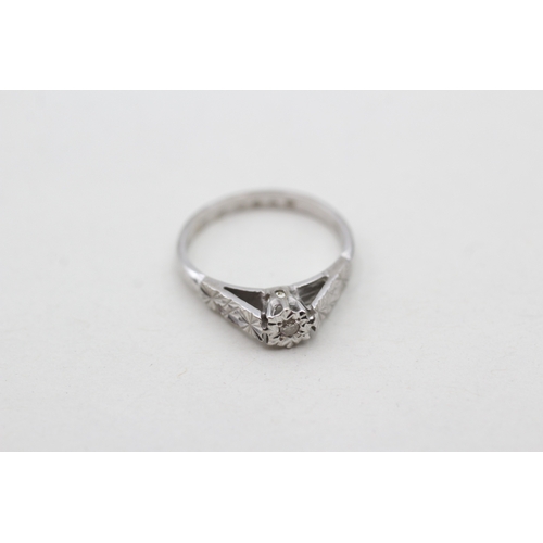 221 - 9ct white gold diamond set solitaire ring (2g) Size L