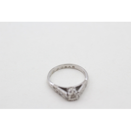 221 - 9ct white gold diamond set solitaire ring (2g) Size L