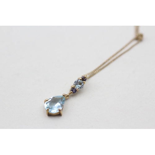 225 - 9ct gold blue topaz and iolite set pendant necklace (1.7g)