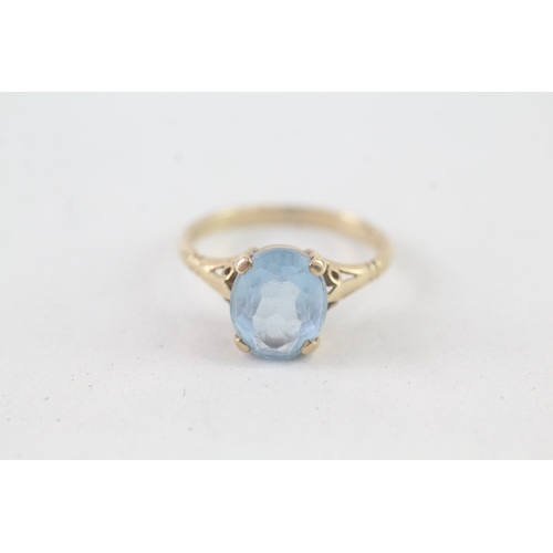 231 - 9ct gold blue paste dress ring (2.3g) Size L