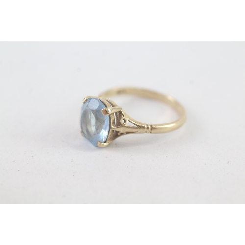 231 - 9ct gold blue paste dress ring (2.3g) Size L