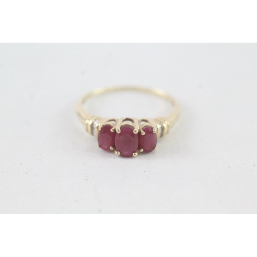 232 - 9ct gold enhanced ruby & diamond ring (2g) Size O