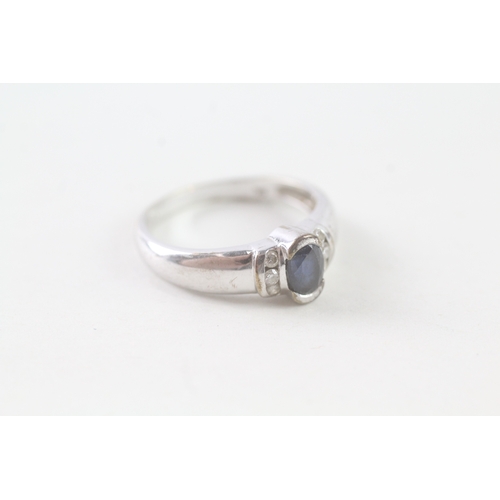 24 - 9ct white gold sapphire and diamond framed ring (3.1g) Size O