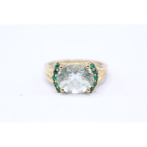 242 - 9ct gold prusiolite and emerald set ring (3.6g) Size P