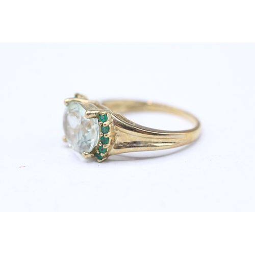 242 - 9ct gold prusiolite and emerald set ring (3.6g) Size P