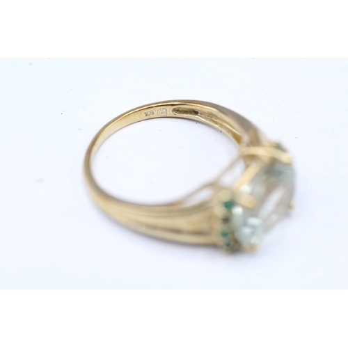 242 - 9ct gold prusiolite and emerald set ring (3.6g) Size P