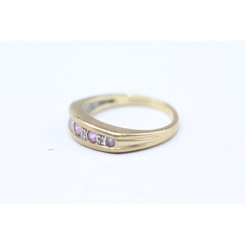 244 - 9ct gold diamond and pink sapphire set ring (2.9g) Size M