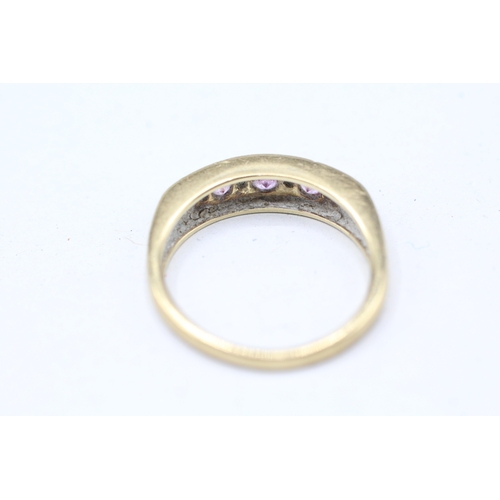 244 - 9ct gold diamond and pink sapphire set ring (2.9g) Size M