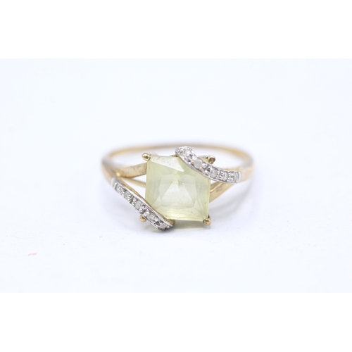 246 - 9ct gold diamond and yellow gemstone set ring (2.3g)  Size S