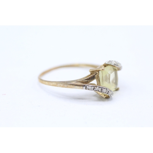 246 - 9ct gold diamond and yellow gemstone set ring (2.3g)  Size S