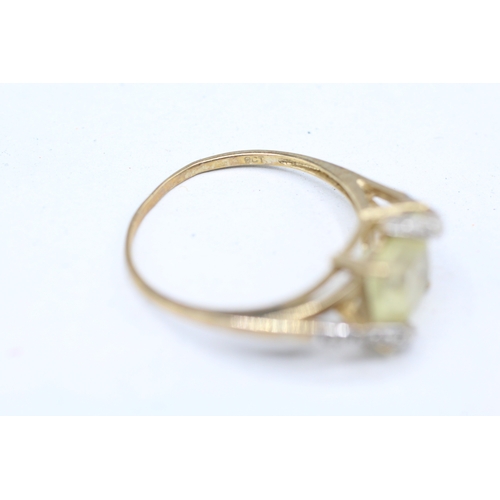 246 - 9ct gold diamond and yellow gemstone set ring (2.3g)  Size S