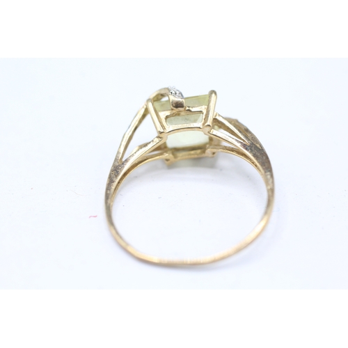 246 - 9ct gold diamond and yellow gemstone set ring (2.3g)  Size S