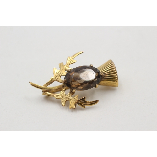 35 - 9ct gold smokey quartz thistle brooch (4g)