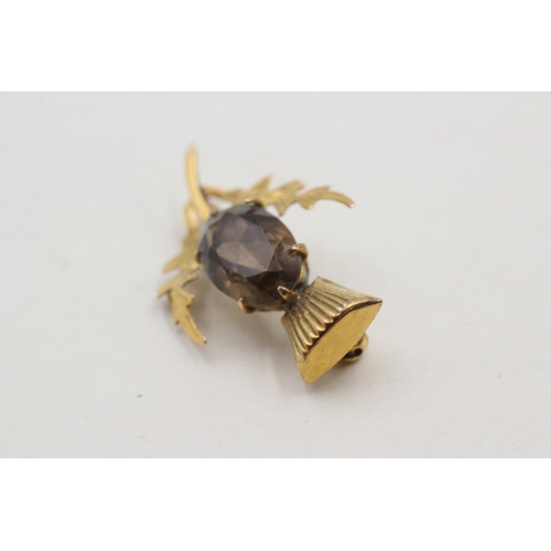 35 - 9ct gold smokey quartz thistle brooch (4g)