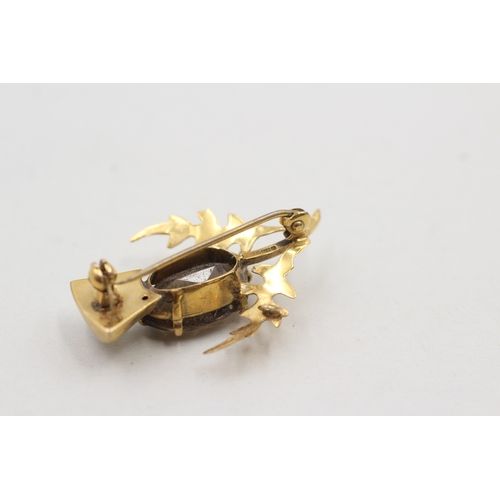 35 - 9ct gold smokey quartz thistle brooch (4g)