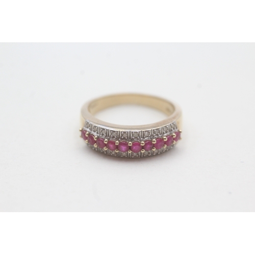 37 - 9ct gold diamond and ruby set half hoop eternity ring (4g) Size P