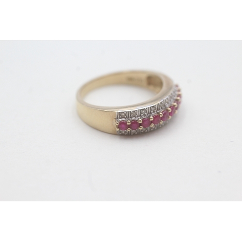 37 - 9ct gold diamond and ruby set half hoop eternity ring (4g) Size P