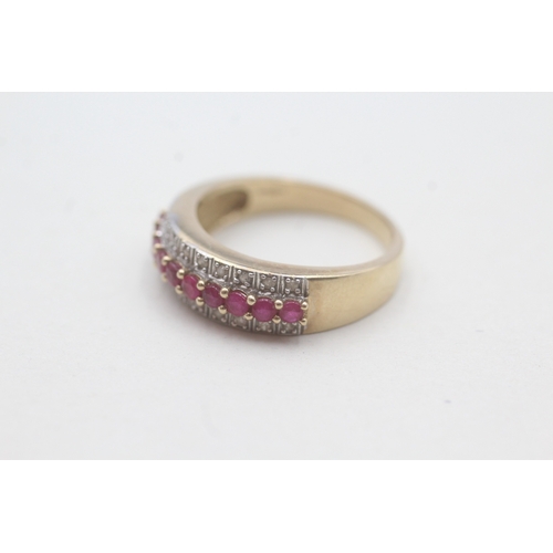 37 - 9ct gold diamond and ruby set half hoop eternity ring (4g) Size P