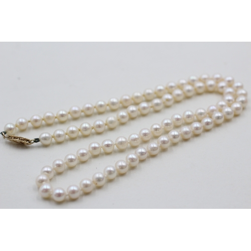 50 - 9ct gold cultured pearl necklace (18.8g)