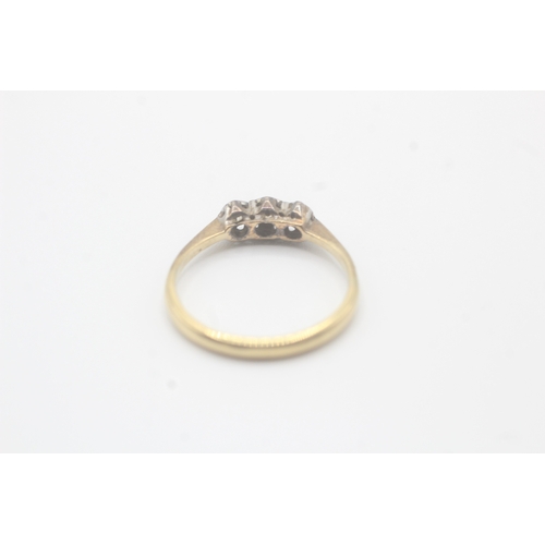 51 - 18ct gold diamond three stone ring (2.3g) Size N 1/2