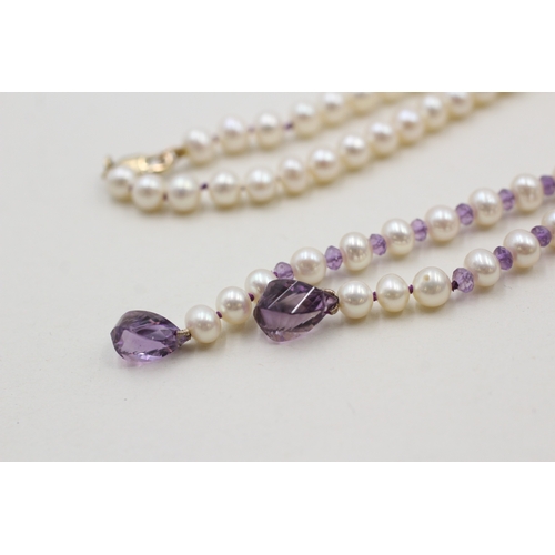 56 - 9ct gold amethyst and cultured pearl necklace (23.3g)