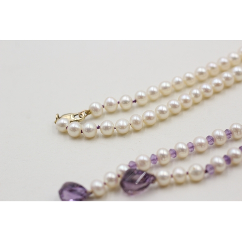 56 - 9ct gold amethyst and cultured pearl necklace (23.3g)