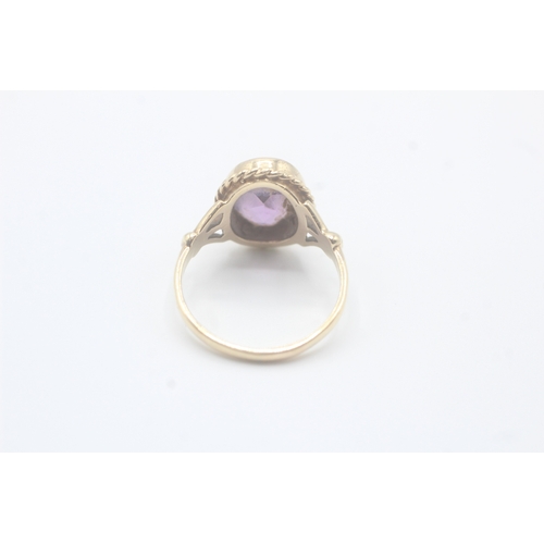 57 - 9ct gold amethyst single stone ring (4g) Size Q