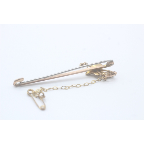 60 - 9ct gold fox head bar brooch with base metal pin (2g)