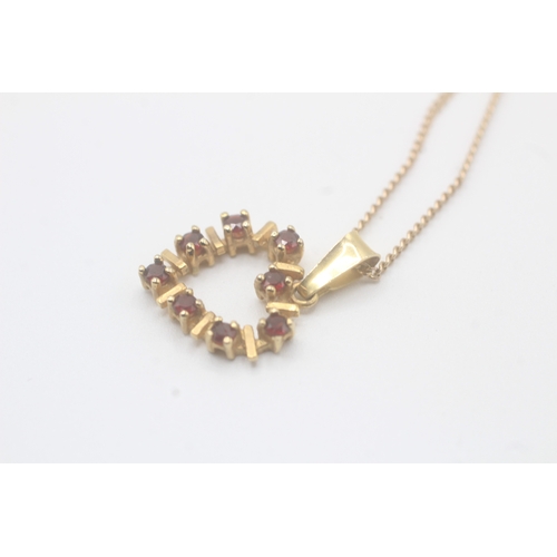 73 - 9ct gold garnet heart pendant necklace (2.8g)