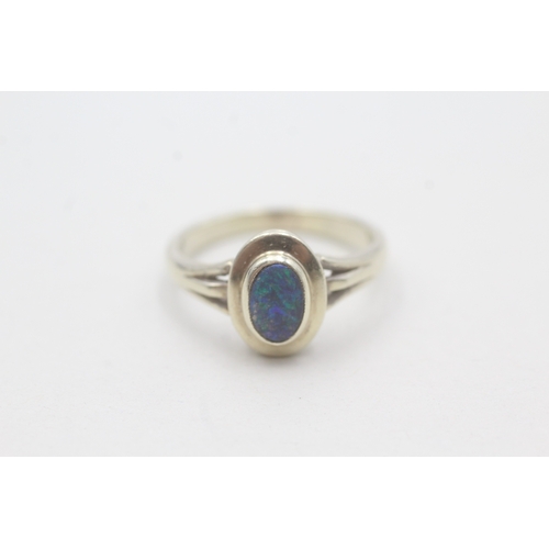 83 - 9ct gold opal doublet ring (3.4g) Size N