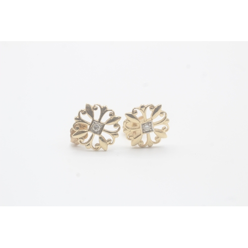 85 - 14ct gold diamond single stone floral stud earrings (2g)