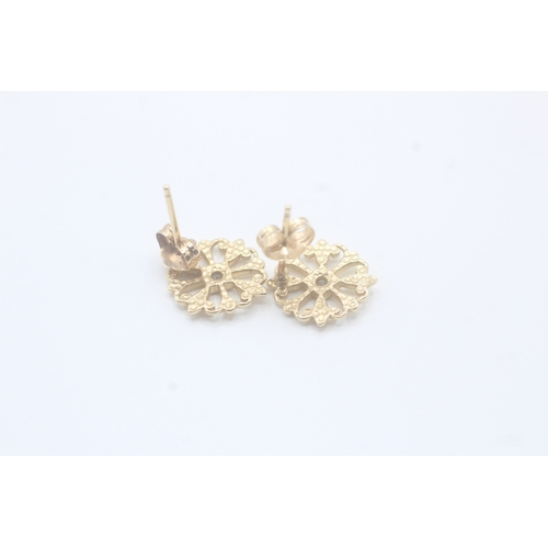 85 - 14ct gold diamond single stone floral stud earrings (2g)