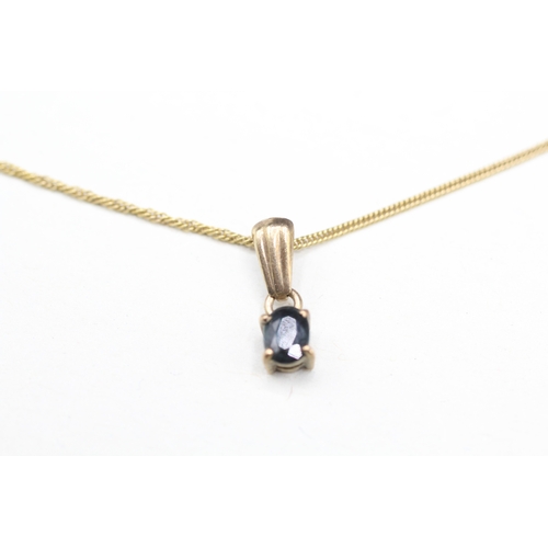 87 - 9ct gold sapphire single stone pendant necklace (1.5g)