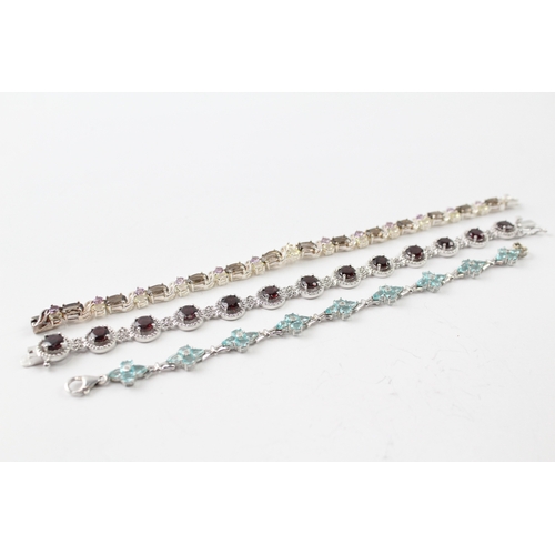 256 - Collection of Sterling Silver Gemstone Bracelets inc. Topaz, Garnet x 3 34g