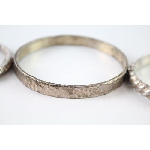 267 - Collection of Sterling Silver Bangles inc. Hammered, Torque, Modernist x 3 89g