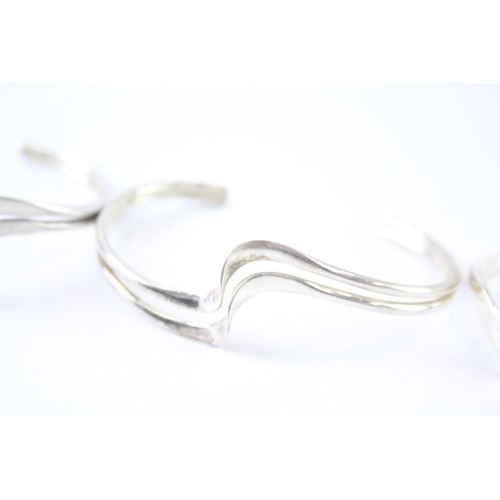 278 - Collection of Sterling Silver Bangles inc. Modernist, Wave, Bee, Torque x 4 50g