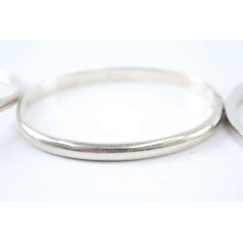 289 - Collection of Sterling Silver Bangles inc. Hot Diamond, Modernist x 3 80g