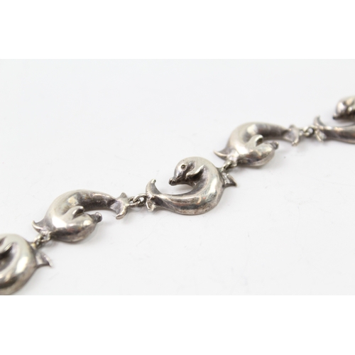 297 - Sterling Silver Dolphin Link Bracelet 43g