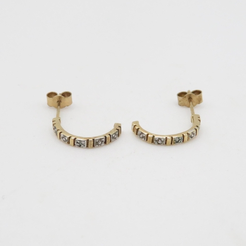 139 - 9ct gold diamond c-hoop earrings (0.9g)